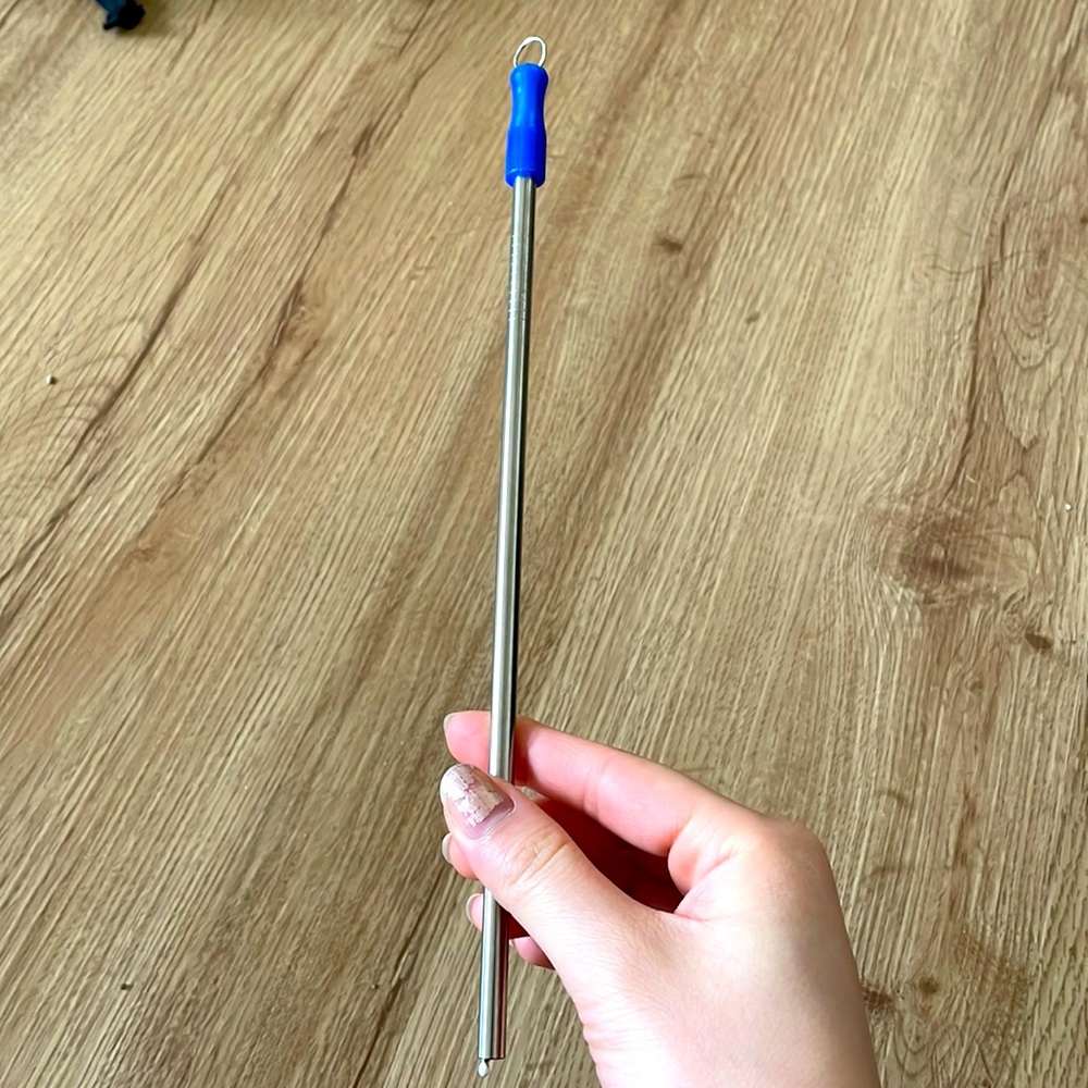 Brand new metal straw with cleaner